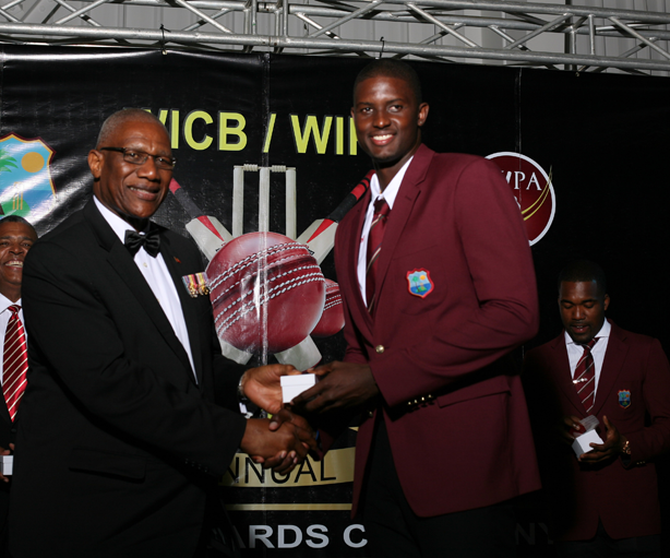 Jason Holder collecting his ring from the Governor General of Antigua