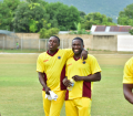 Teammates Pedro Collins and WIPA President & CEO Wavell Hinds
