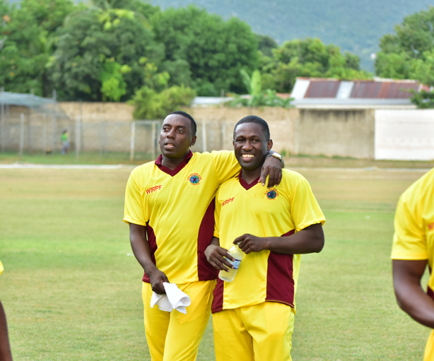 Teammates Pedro Collins and WIPA President & CEO Wavell Hinds