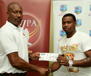 WIPA Vice President Nixon McLean, WIPA member, Christopher Barnwell n